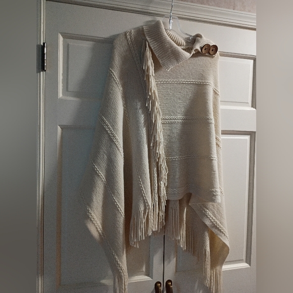 J&W Sweaters - NWT.Cream Knit Poncho with Fringe and Button Detail